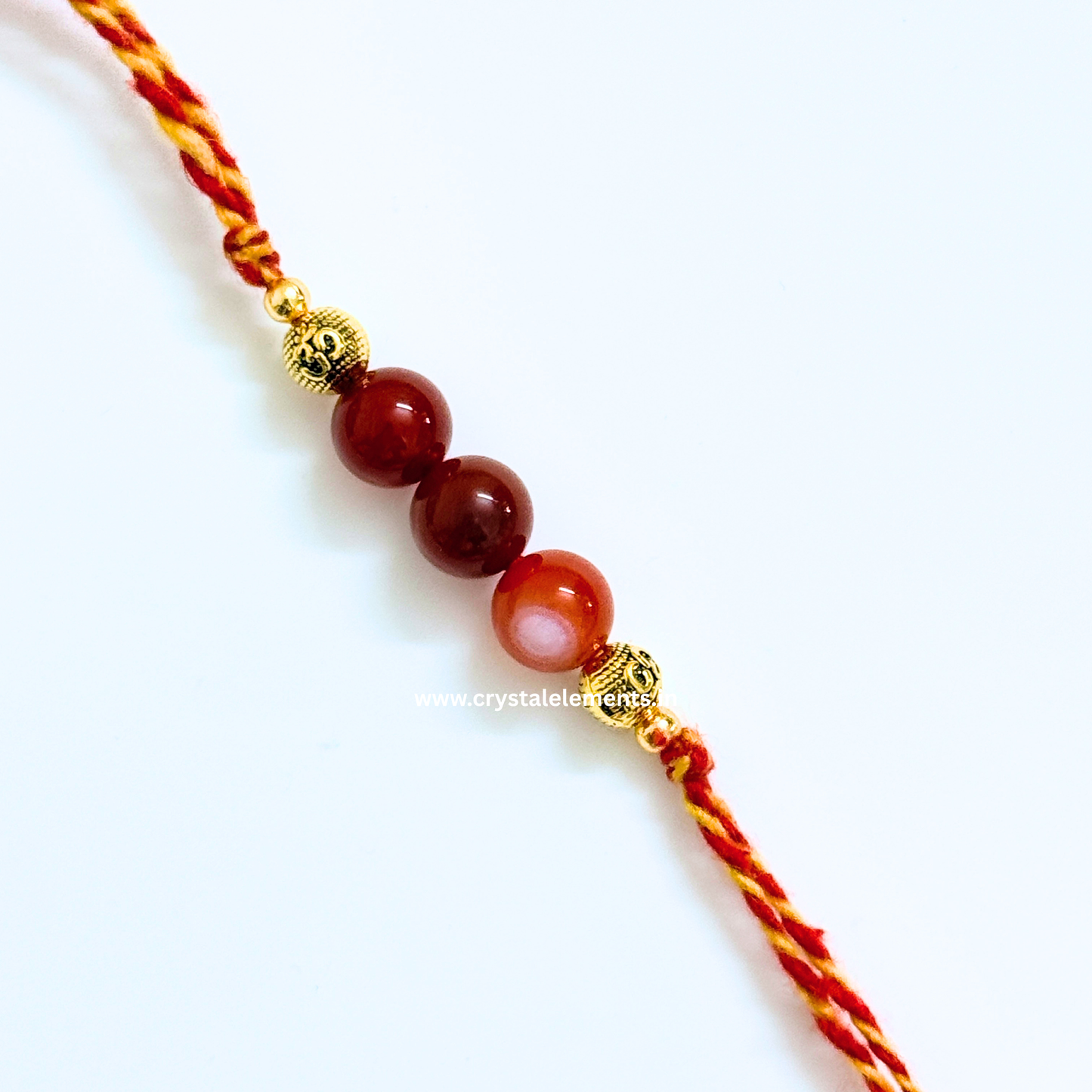 Carnelian Om Rakhi - Courage & Positivity Crystal Rakhi