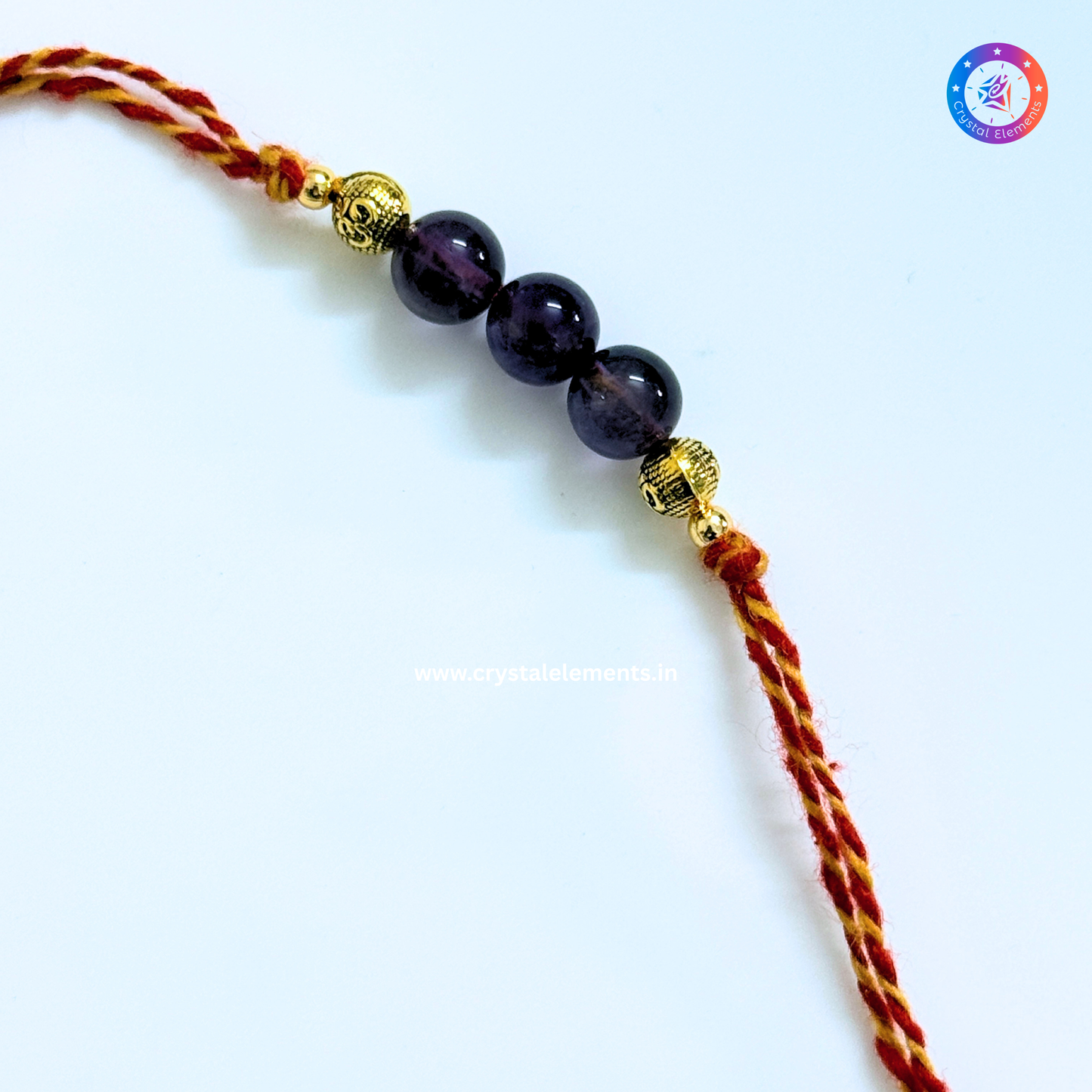 Amethyst Om Rakhi - Peace & Blessings Crystal Rakhi
