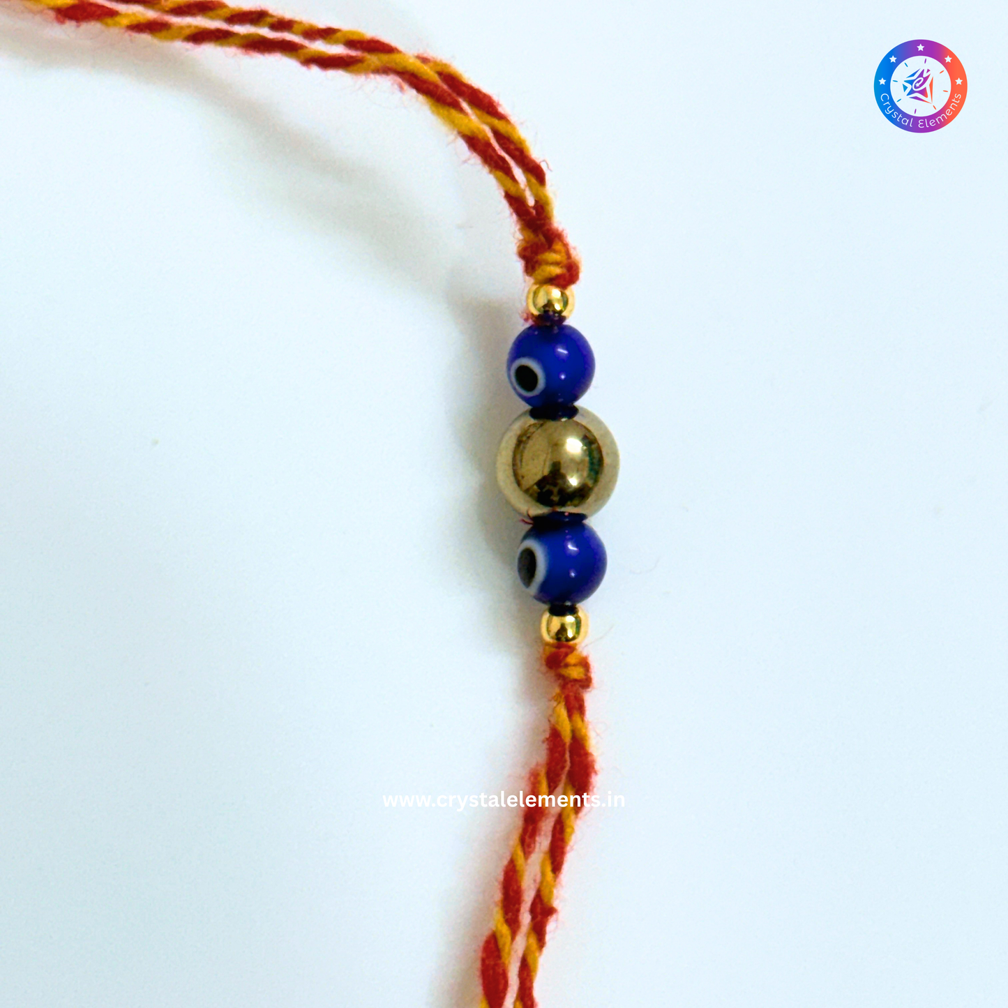 Golden Pyrite & Blue Evil Eye Rakhi - Prosperity & Protection Crystal Rakhi