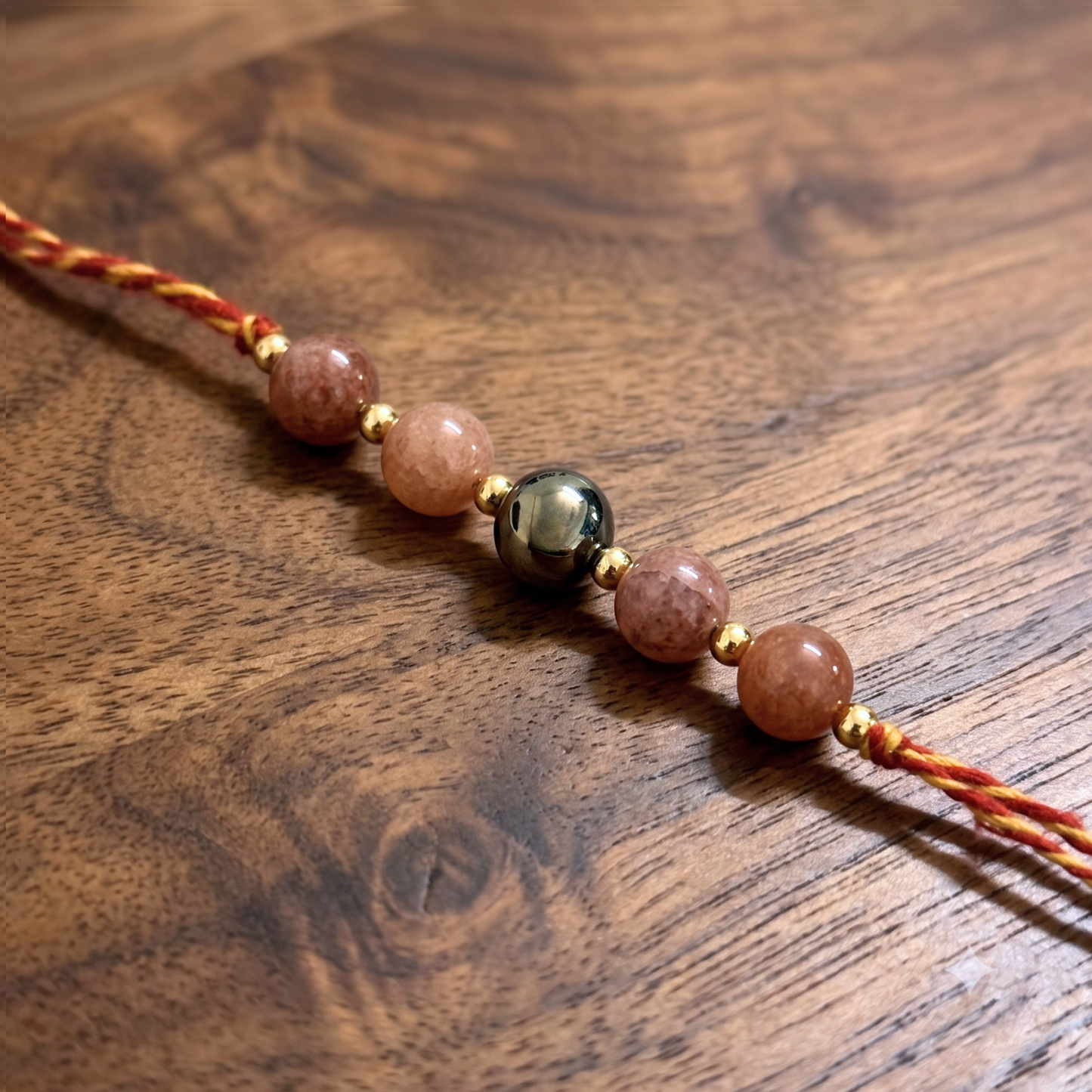 Sunstone & Golden Pyrite Rakhi - Joy & Prosperity Crystal Rakhi
