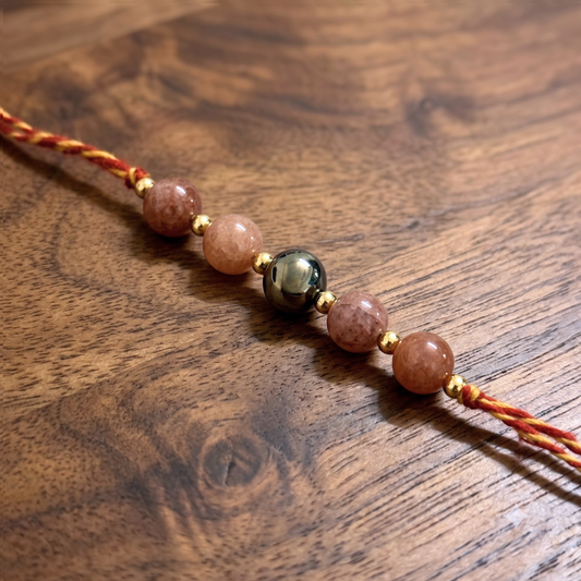 Sunstone & Golden Pyrite Rakhi - Joy & Prosperity Crystal Rakhi